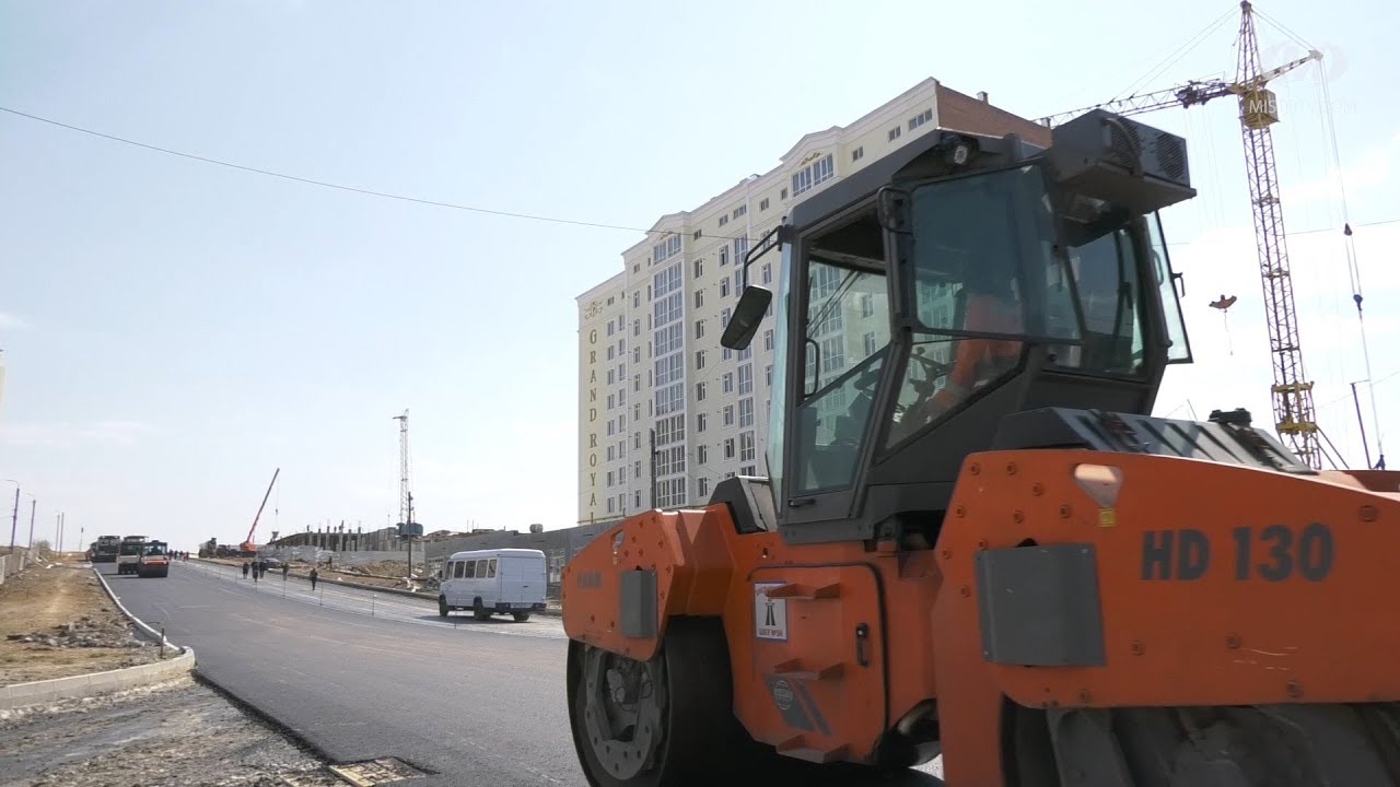 Новій дорозі — перший шар асфальтобетону